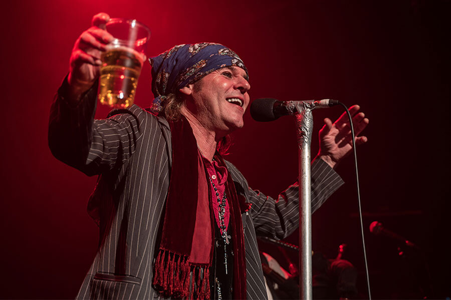 Islington shot of Spike holding drink